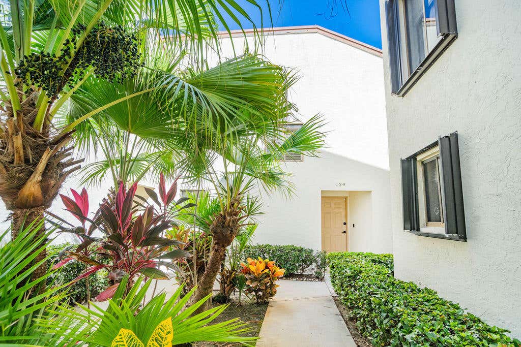 Photo of 950 S Kanner Hwy Highway #Townhouse 124, Stuart, FL 34994 (MLS # B26048663)