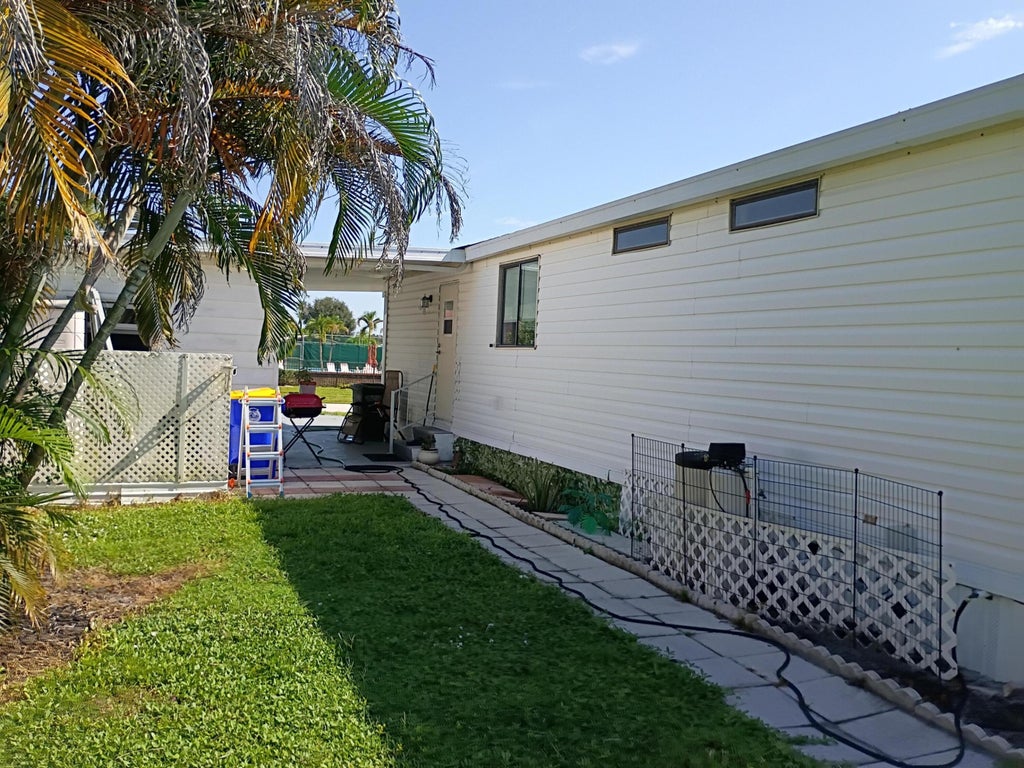 Photo of 2788 SW Thunderbird Trail, Stuart, FL 34997 (MLS # B26067493)