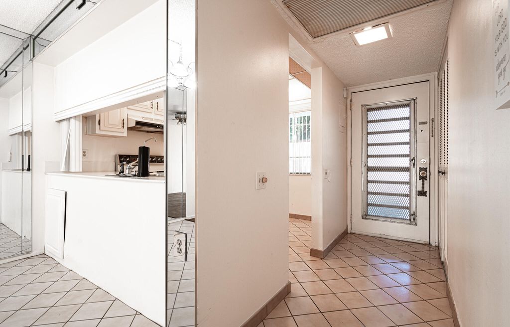 Photo of 4602 Martinique Way #E1, Coconut Creek, FL 33066 (MLS # R11168308)