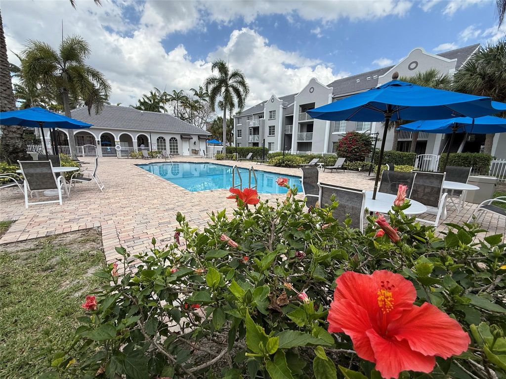 Photo of 11165 SW 6th Street #204, Pembroke Pines, FL 33025 (MLS # B26032456)