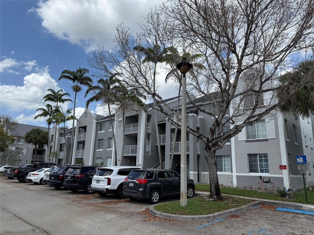 Photo of 11165 SW 6th Street #204, Pembroke Pines, FL 33025 (MLS # B26032456)