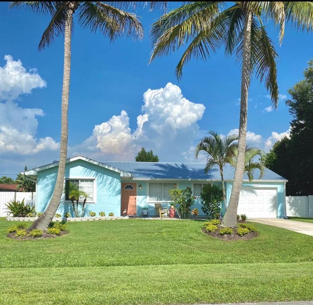 Photo of 1751 SE Mansfield Street St, Port St Lucie, FL 34952 (MLS # R10826164)