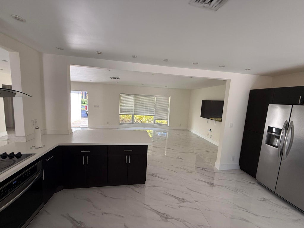 Photo of 1321 MADISON Street, Hollywood, FL 33019 (MLS # B26077256)