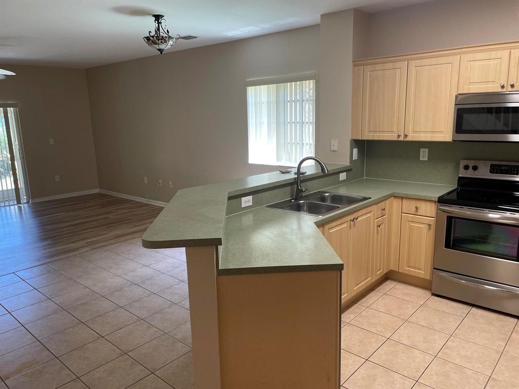 Photo of 5051 SE Mariner Garden Circle, Stuart, FL 34997 (MLS # R11091874)