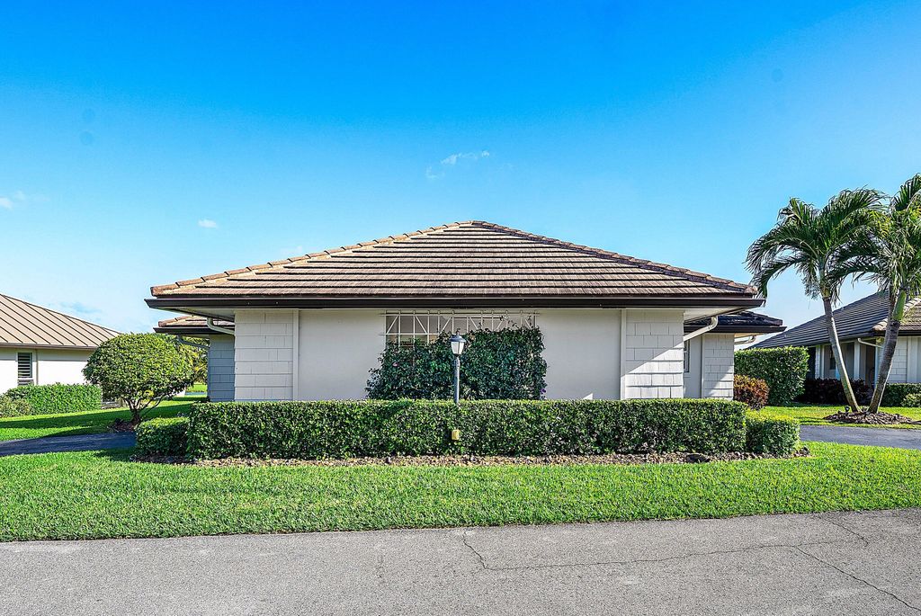 Photo of 322 Cedar Key Circle, Atlantis, FL 33462 (MLS # R11161873)