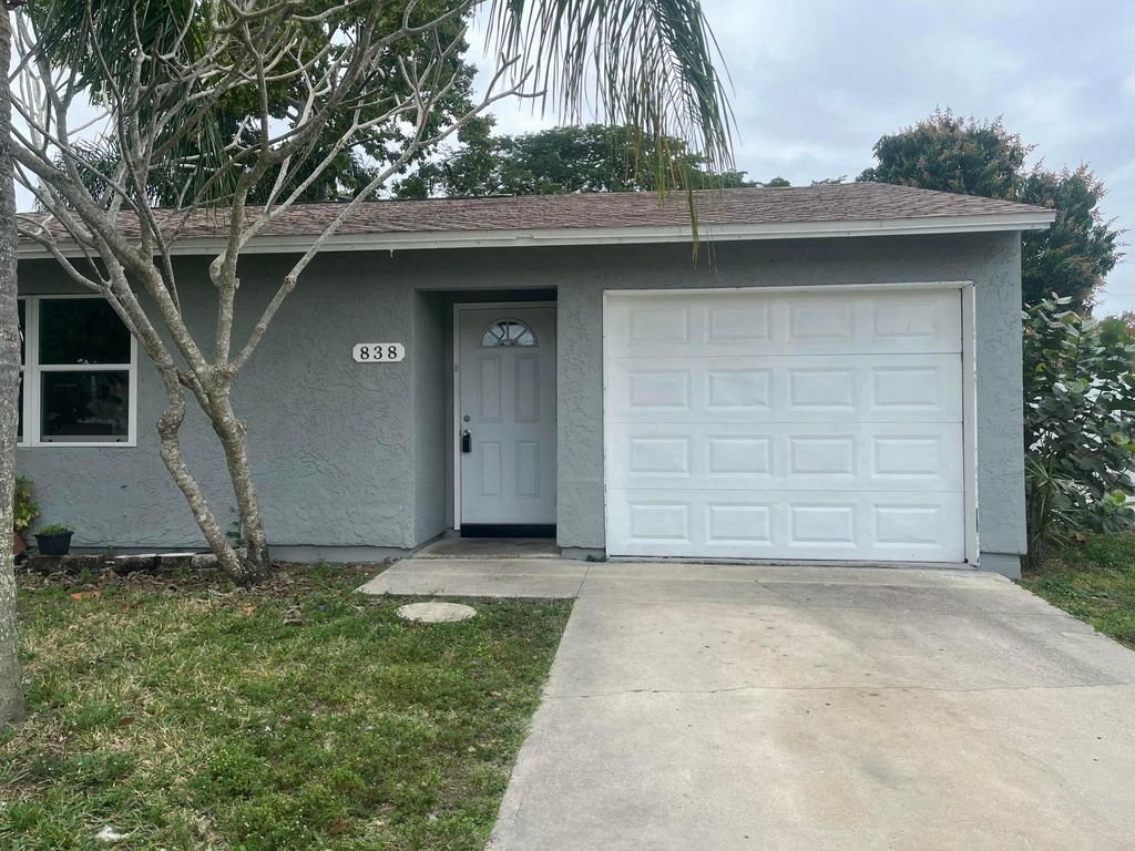 Photo of 838 SE Proctor Lane, Port Saint Lucie, FL 34983 (MLS # B26012769)