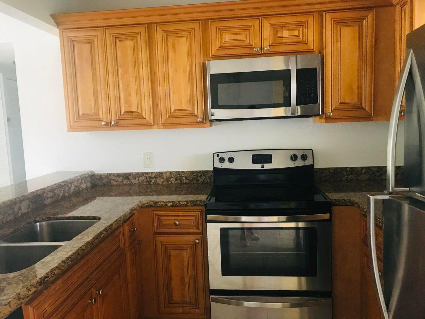 PALM BEACH GRANDE CONDOMINIUM - Residential Lease