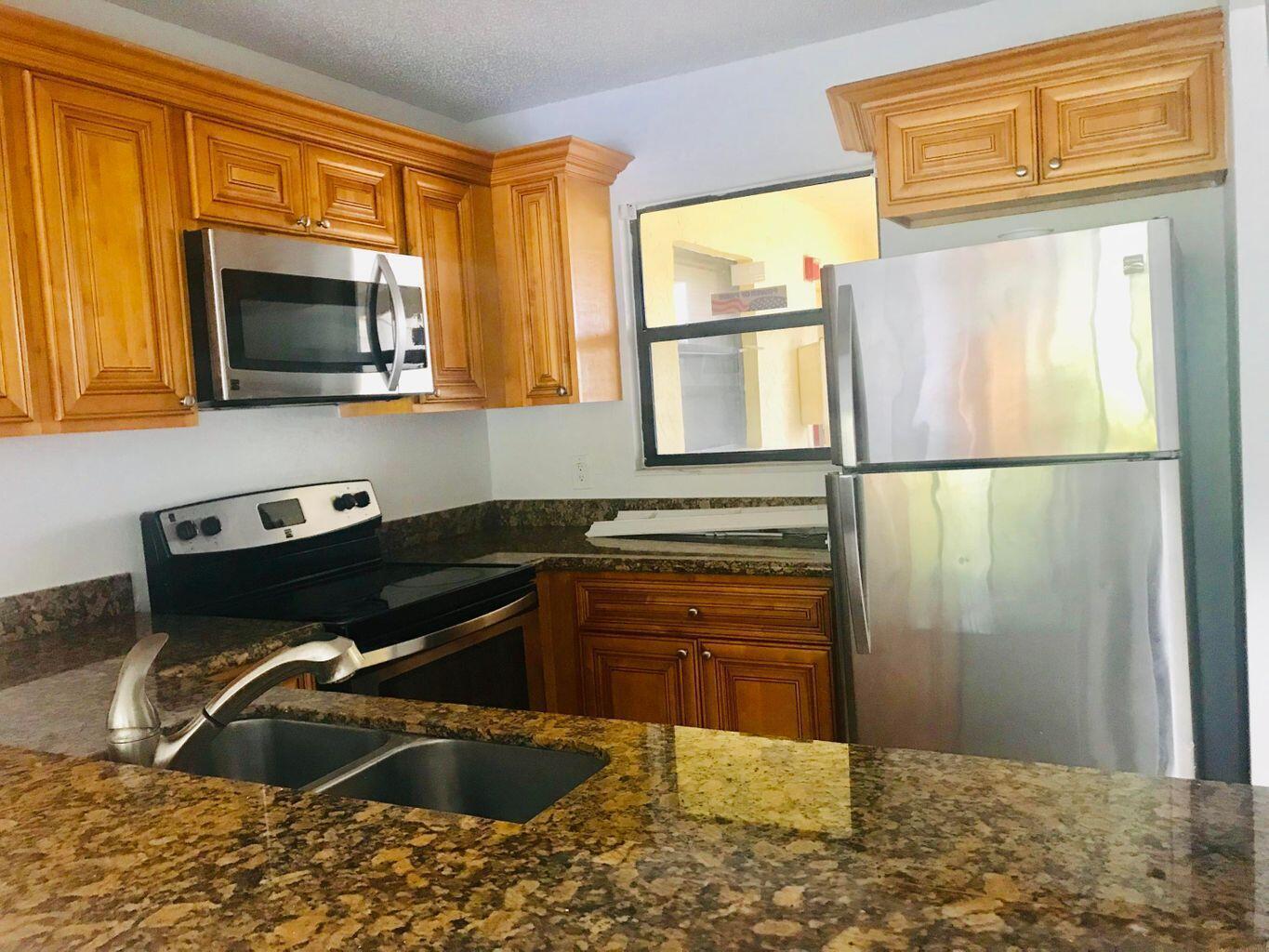 PALM BEACH GRANDE CONDOMINIUM - Residential Lease