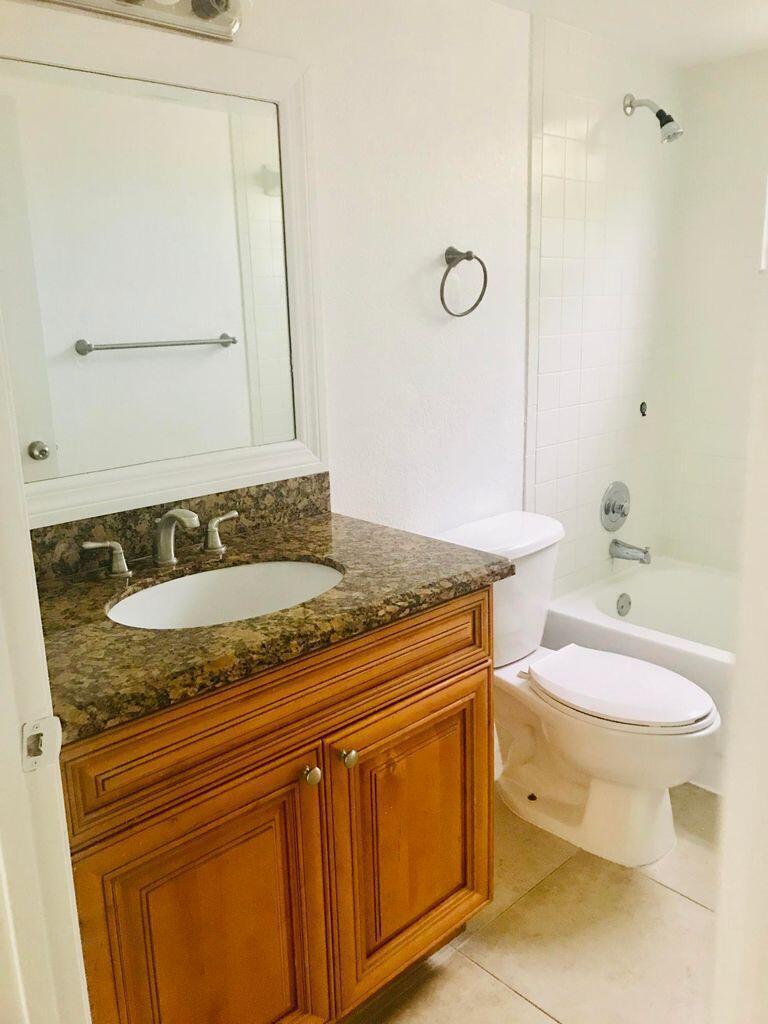 PALM BEACH GRANDE CONDOMINIUM - Residential Lease