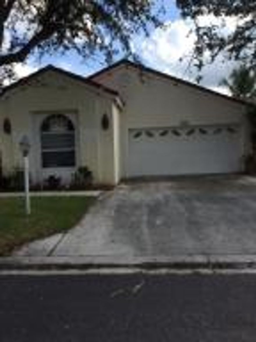 Freshly renovated 3 bedroom home with a screened patio and fenced backyard