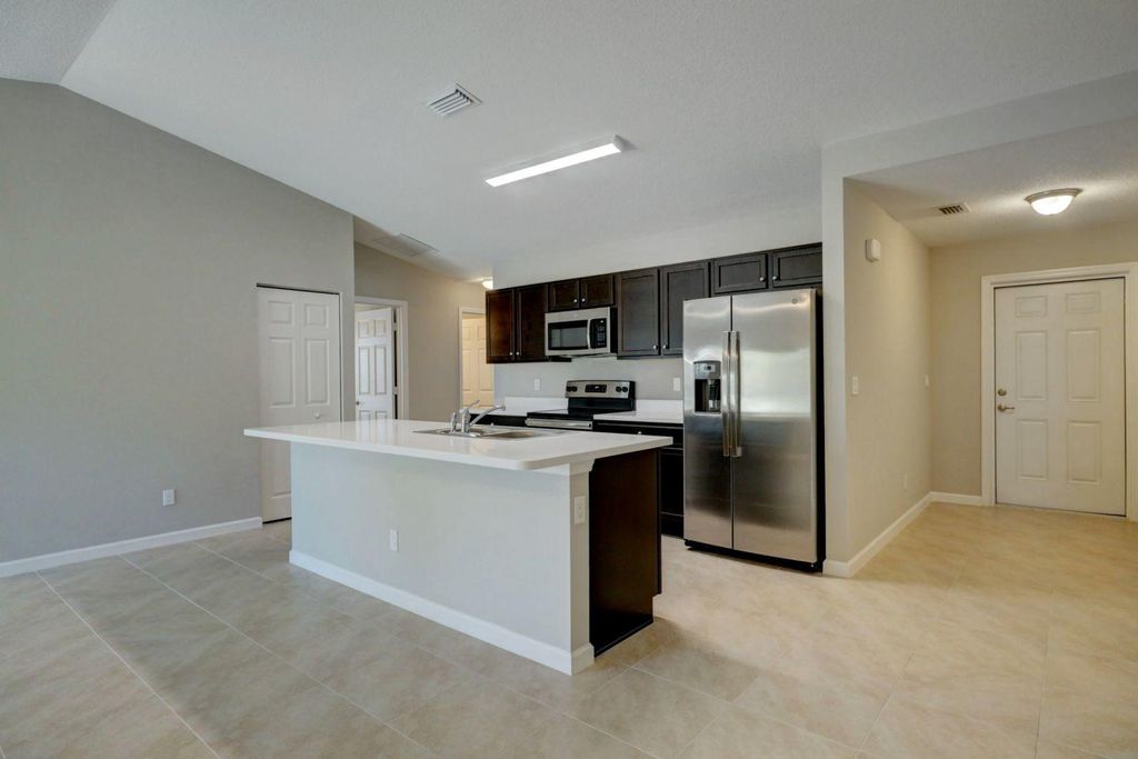 Photo of 3099 SW Briggs Street, Port Saint Lucie, FL 34953 (MLS # R11169055)