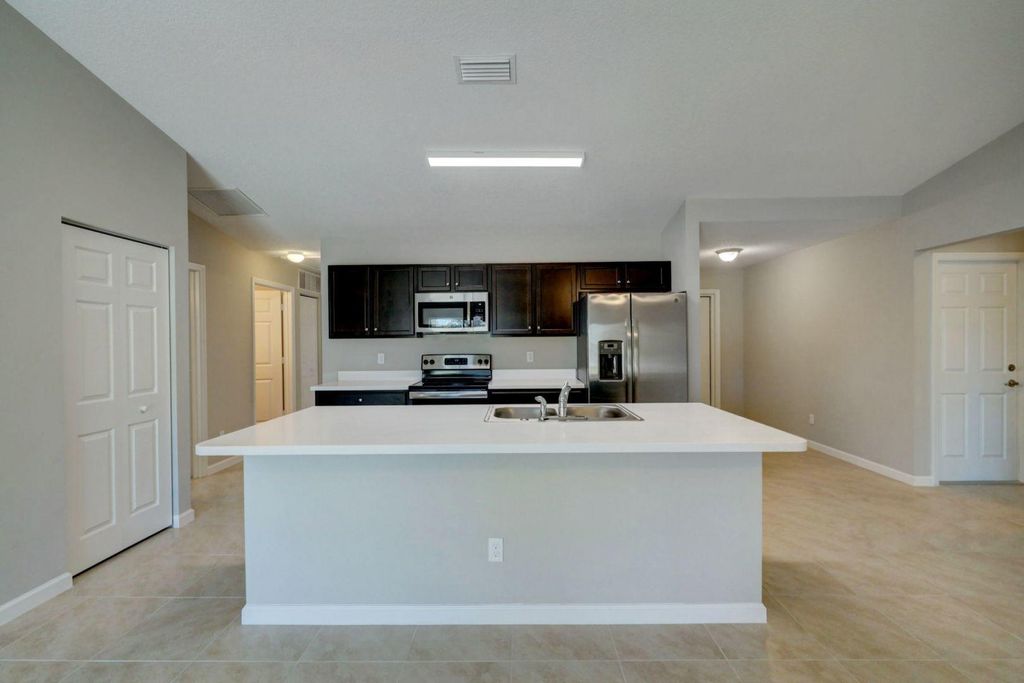 Photo of 3099 SW Briggs Street, Port Saint Lucie, FL 34953 (MLS # R11169055)