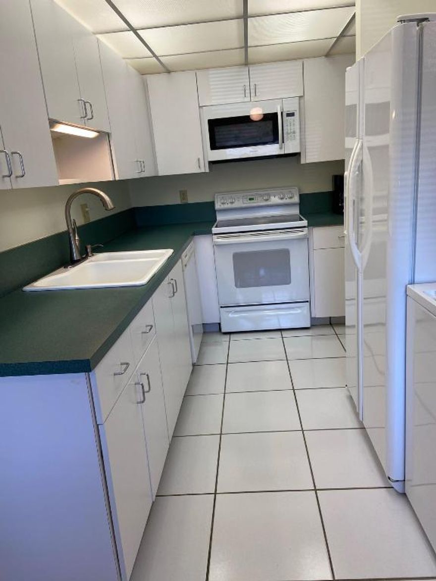 Sunny Corner property across from North Clubhouse. Bright Kitchen, Formal Dining Room, Comfortable Living Room, Sun Room. Beautiful Natural wood Furnishings.
Ceramic Tile and Laminated Hardwood Flooring. Remodeled Bathrooms Customized Closets.. 2nd Bedroom used as Office or Den.  The Pines of Delray North is a Friendly Gated Community.
Only 10 minutes to the beach and 5 minutes to trendy Atlantic Avenue with upscale Restaurants and Shops,  The Community offers 2 Clubhouses, Pools, and Tennis Courts. Pickle Ball, Bocca, Exercise Room, Billiards, Library; Something for Everyone!