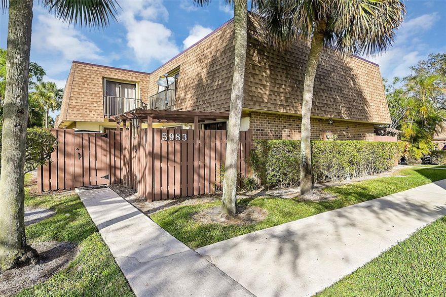 Welcome to this charming courtyard FHA-friendly townhome in the tranquil community of Village of Woodland Lakes in Tamarac. This 3 bed/2.5 bath townhome features a NEW 2023 ROOF, COMPLETE accordion shutters for storm protection, and a 2021 A/C w/a 10-year warranty. The ground floor features kitchen with NEW stainless-steel appliances including a dishwasher and refrigerator.  The first-floor bedroom offers versatility and flexibility as an office or guest room, (NO CLOSET). Ascending to the second floor enjoy laminate flooring throughout, walk-in closets and a double sink vanity in the primary bathroom. Enjoy the comfort of privacy and security with the fenced in patio for outdoor activities and tranquility. Enjoy the community amenities including the clubhouse, pool, and tennis courts.