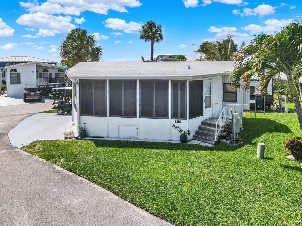 Photo of 1397 Nettles Boulevard, Jensen Beach, FL 34957 (MLS # B26022385)