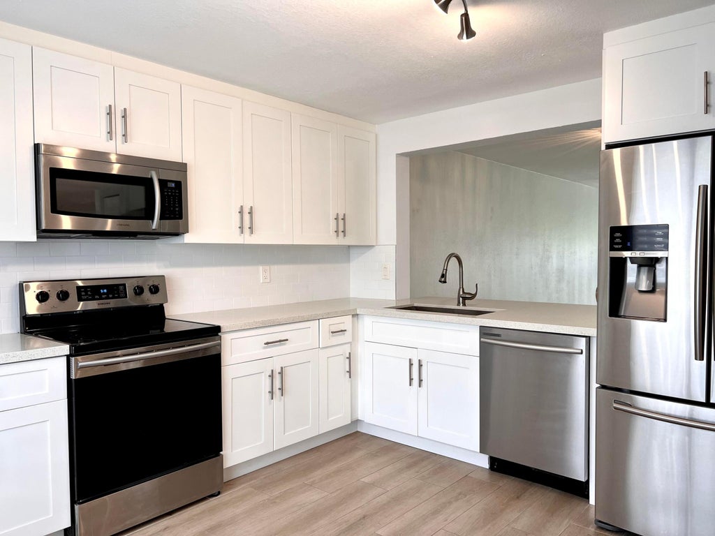 Photo of 5589 Fairway Park Drive #103, Boynton Beach, FL 33437 (MLS # R10971464)