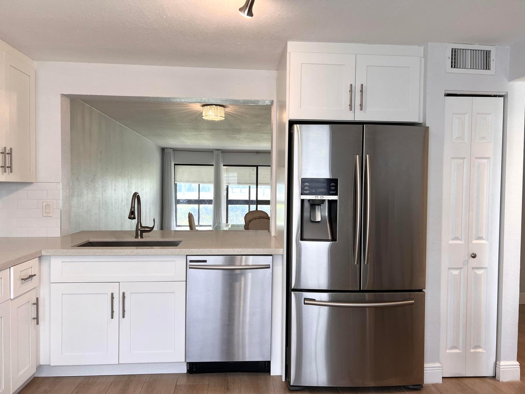 Photo of 5589 Fairway Park Drive #103, Boynton Beach, FL 33437 (MLS # R10971464)
