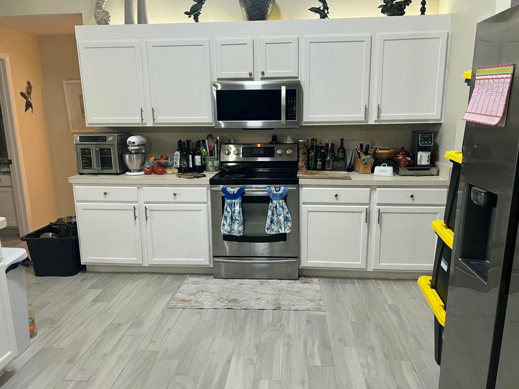 Photo of 616 SW Jaffe Avenue, Port Saint Lucie, FL 34953 (MLS # B26020211)