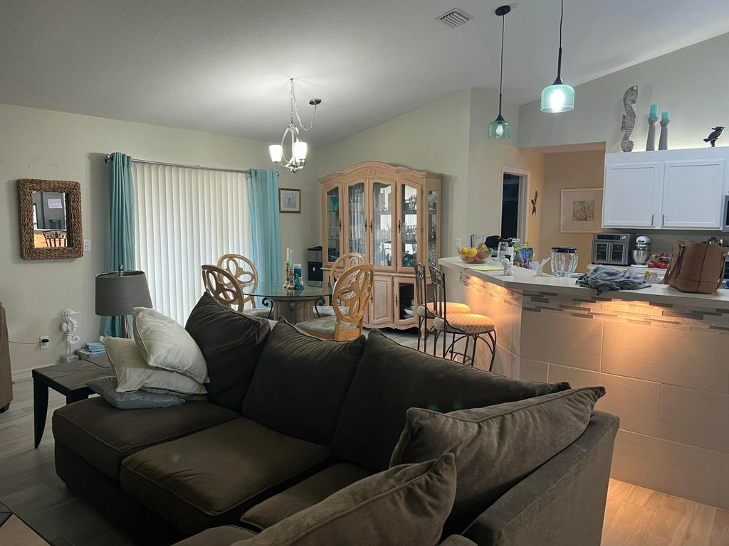 Photo of 616 SW Jaffe Avenue, Port Saint Lucie, FL 34953 (MLS # B26020211)