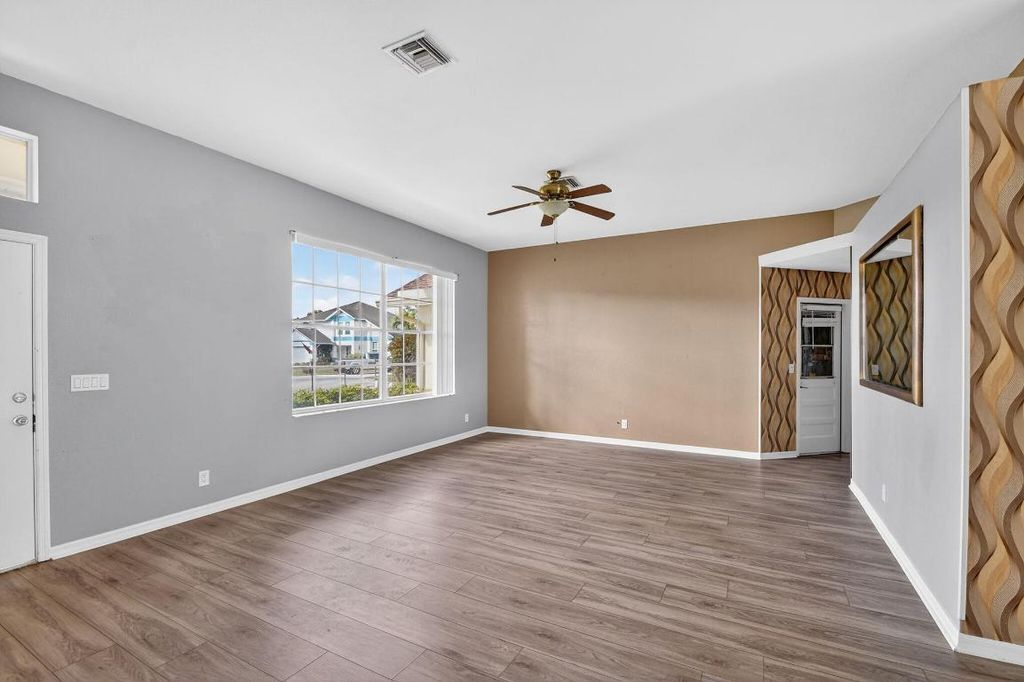 Photo of 3747 Woods Walk Boulevard, Lake Worth, FL 33467 (MLS # R11146468)