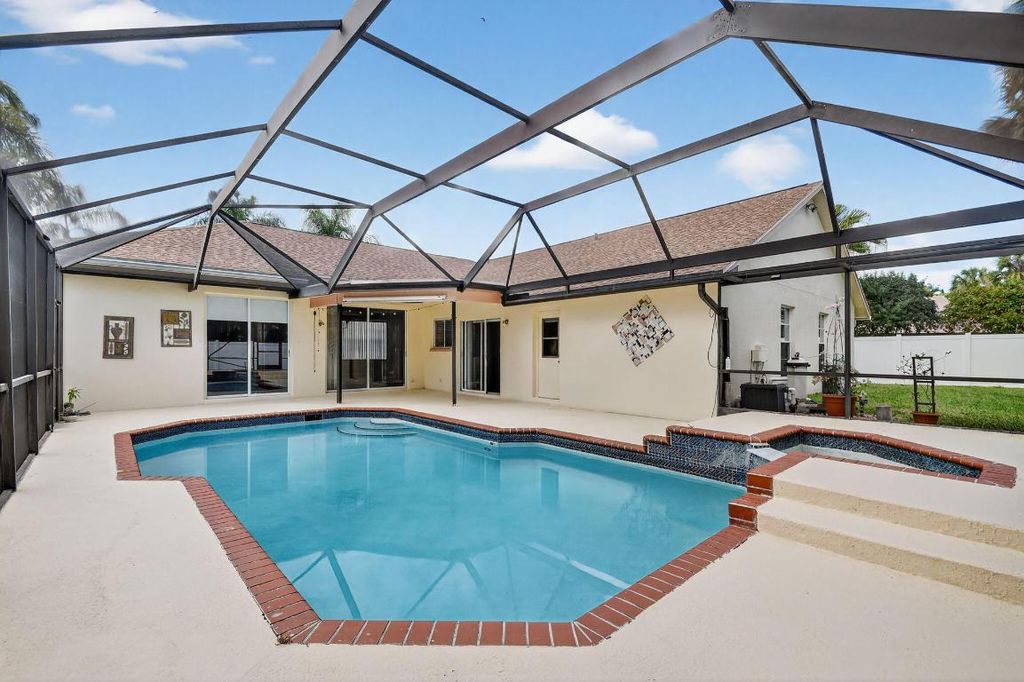 Photo of 3747 Woods Walk Boulevard, Lake Worth, FL 33467 (MLS # R11146468)