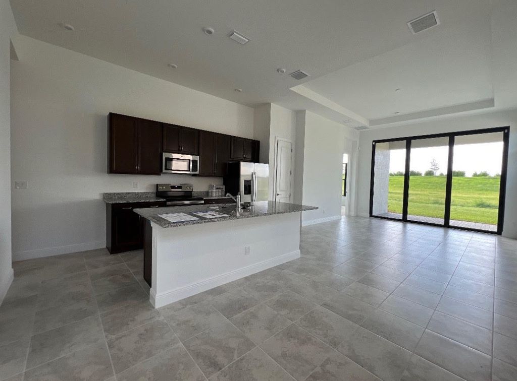 Photo of 10135 SW Latium Way, Port Saint Lucie, FL 34987 (MLS # B26003572)