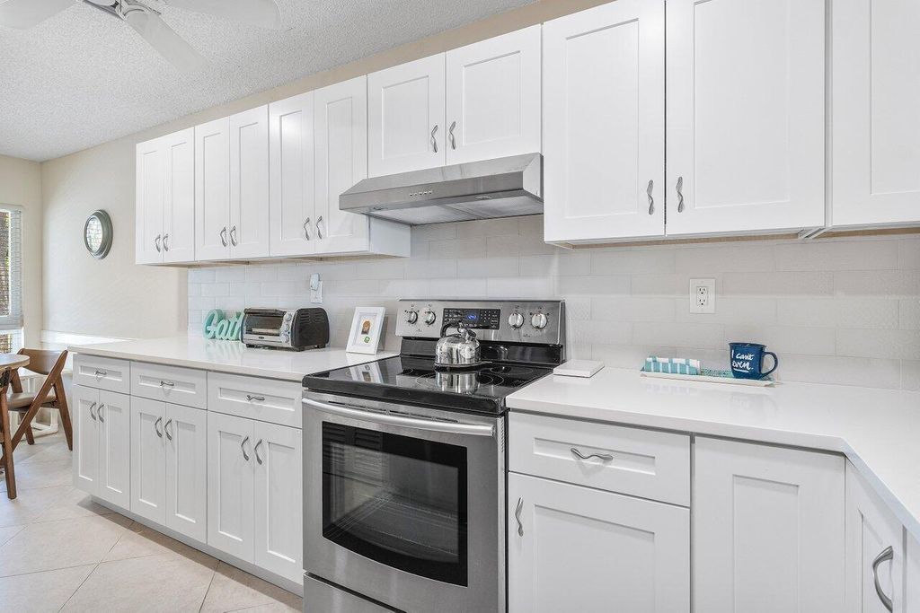 Photo of 5850 Sugar Palm Court, Delray Beach, FL 33484 (MLS # B26023241)