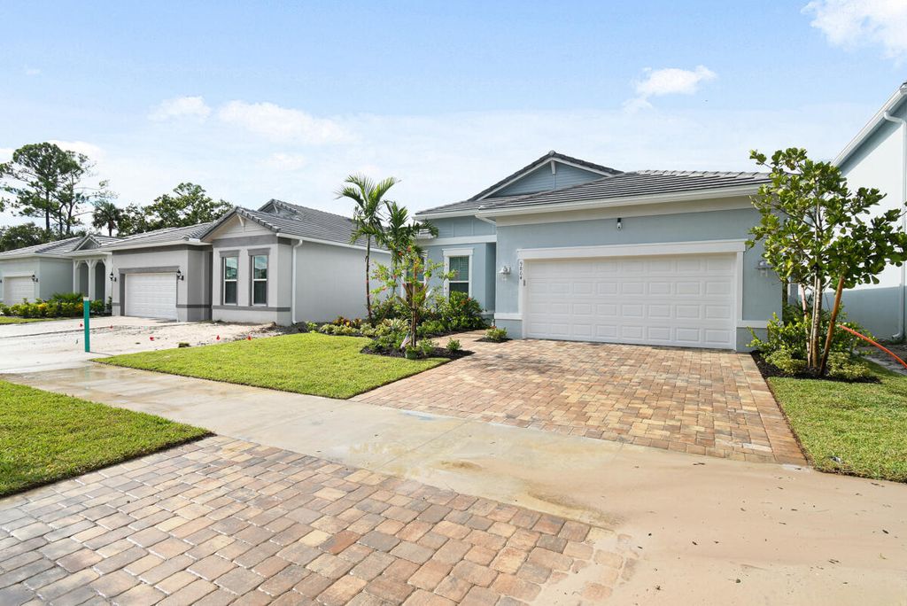 Photo of 9864 SW Meridian Way, Stuart, FL 34997 (MLS # R10983652)