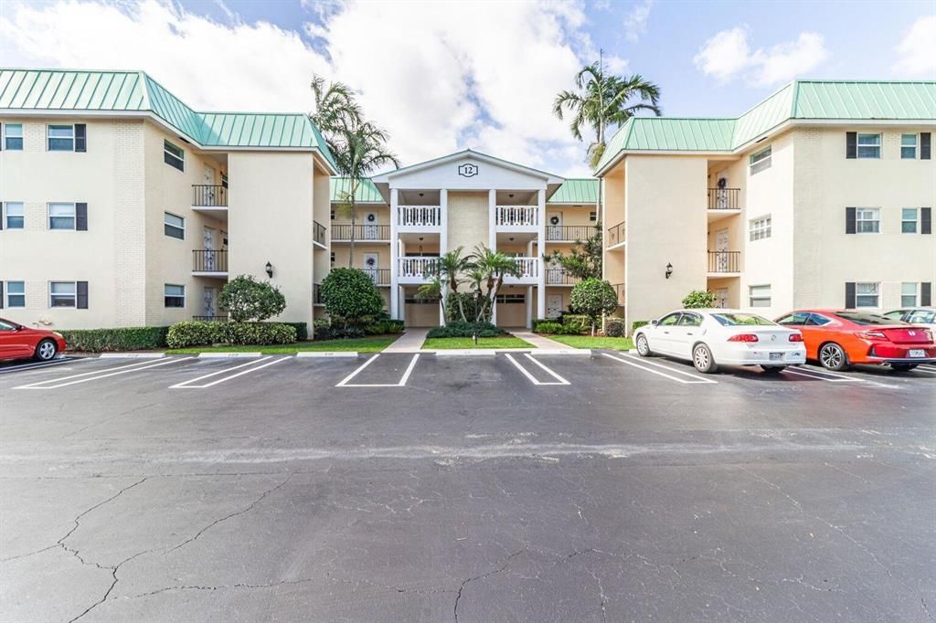 Photo of 12 Colonial Club Drive #105, Boynton Beach, FL 33435 (MLS # R10798557)