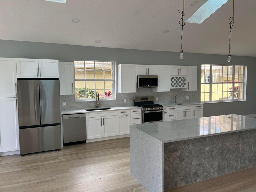 Photo of 8300 Bob O Link Drive, West Palm Beach, FL 33412 (MLS # R11156527)