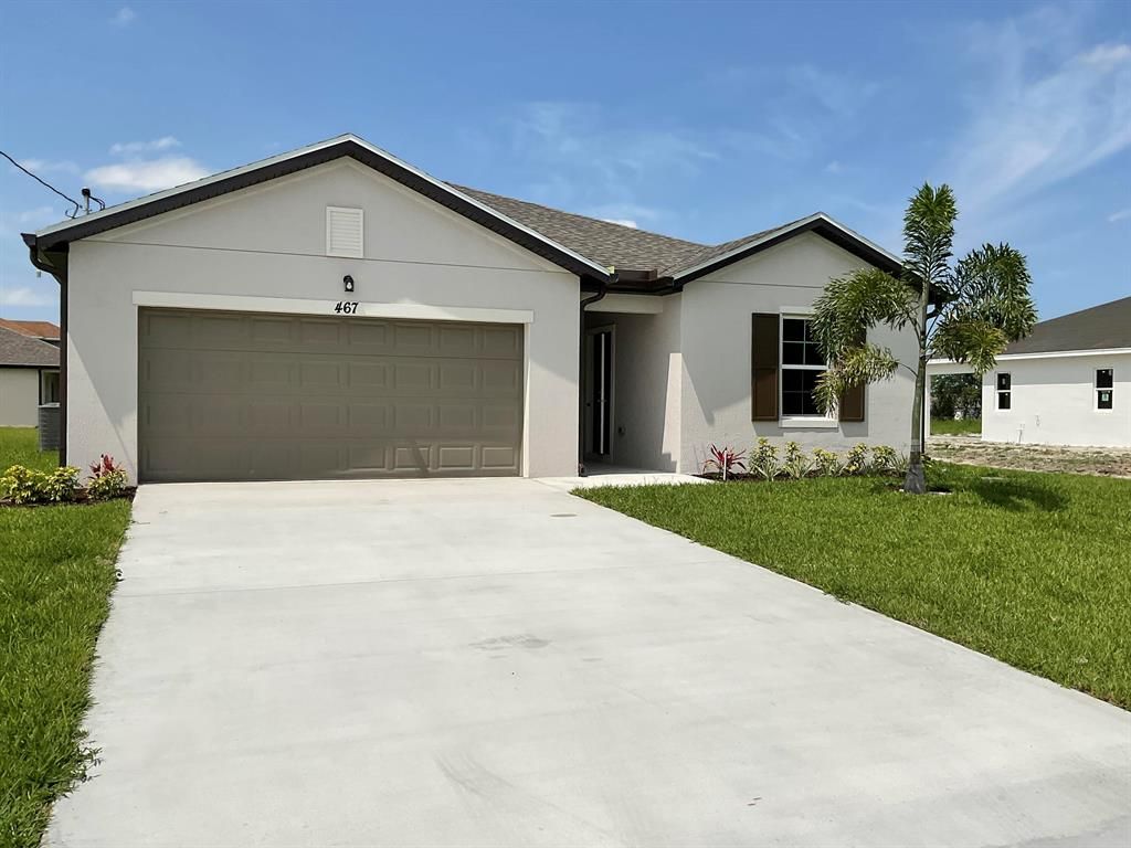 Photo of 467 SW Jeanne Avenue, Port St Lucie, FL 34953 (MLS # R10888197)