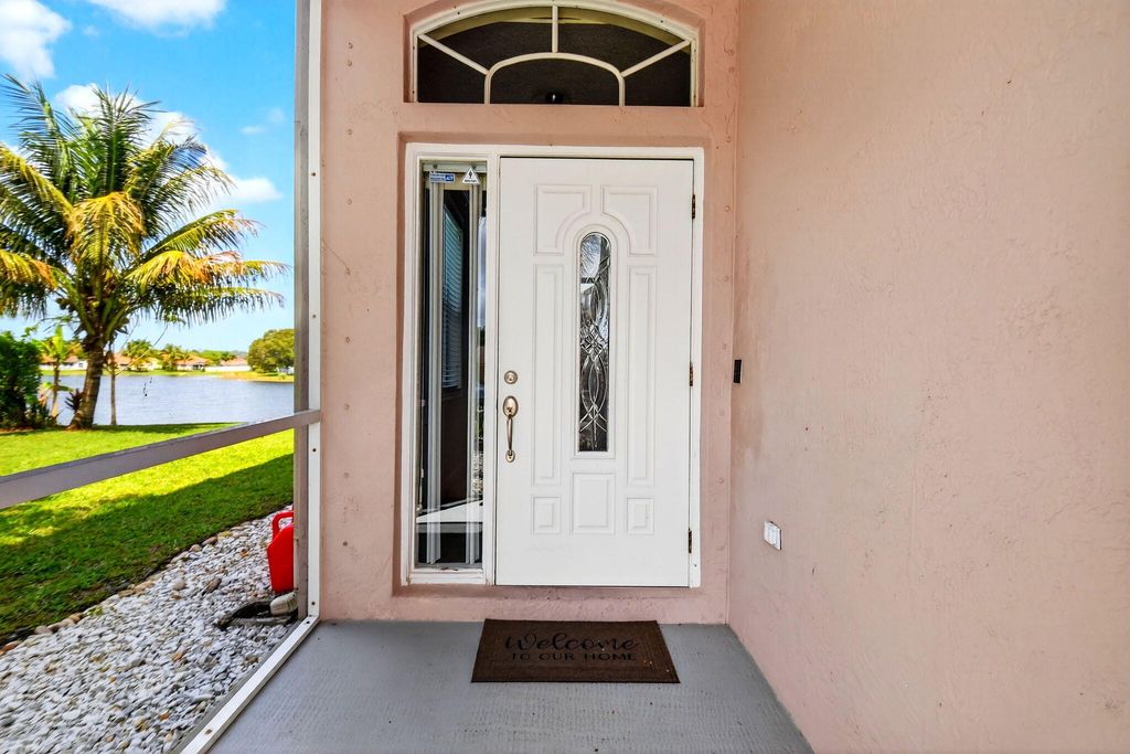 Photo of 7948 La Rose Court, Greenacres, FL 33467 (MLS # B26003161)