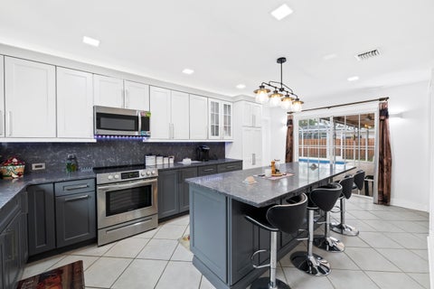 Tiny photo for 1340 SW 56th Avenue, Plantation, FL 33317 (MLS # B26026910)