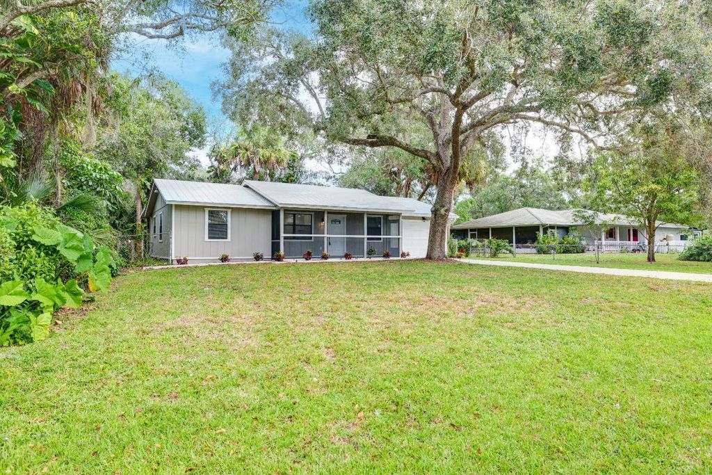 Photo of 7704 Pensacola Road, Fort Pierce, FL 34951 (MLS # R10935410)