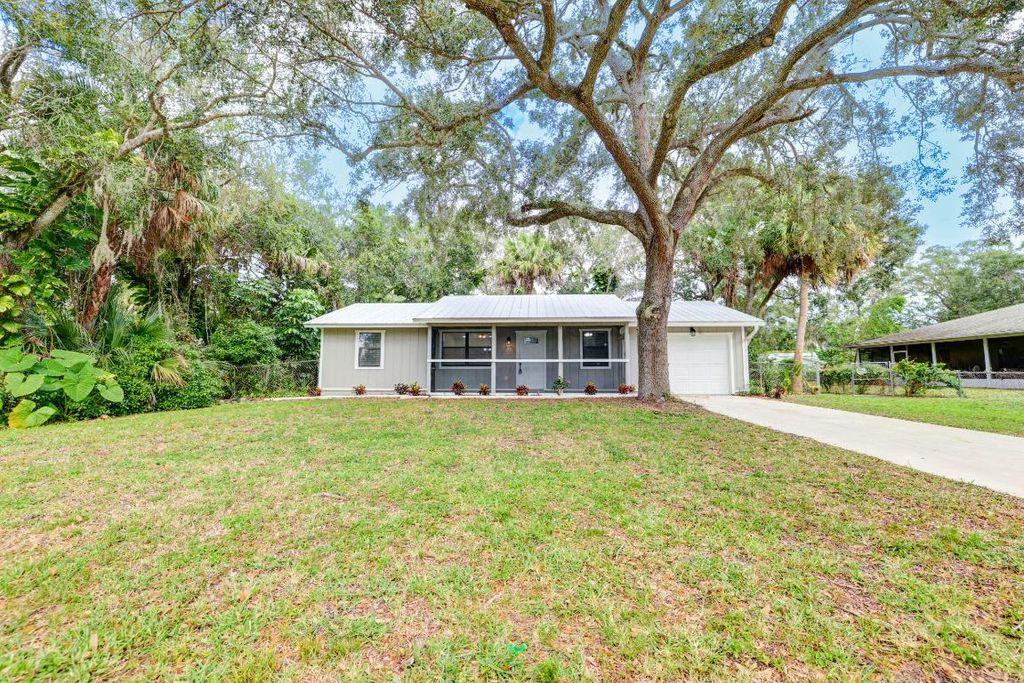 Photo of 7704 Pensacola Road, Fort Pierce, FL 34951 (MLS # R10935410)