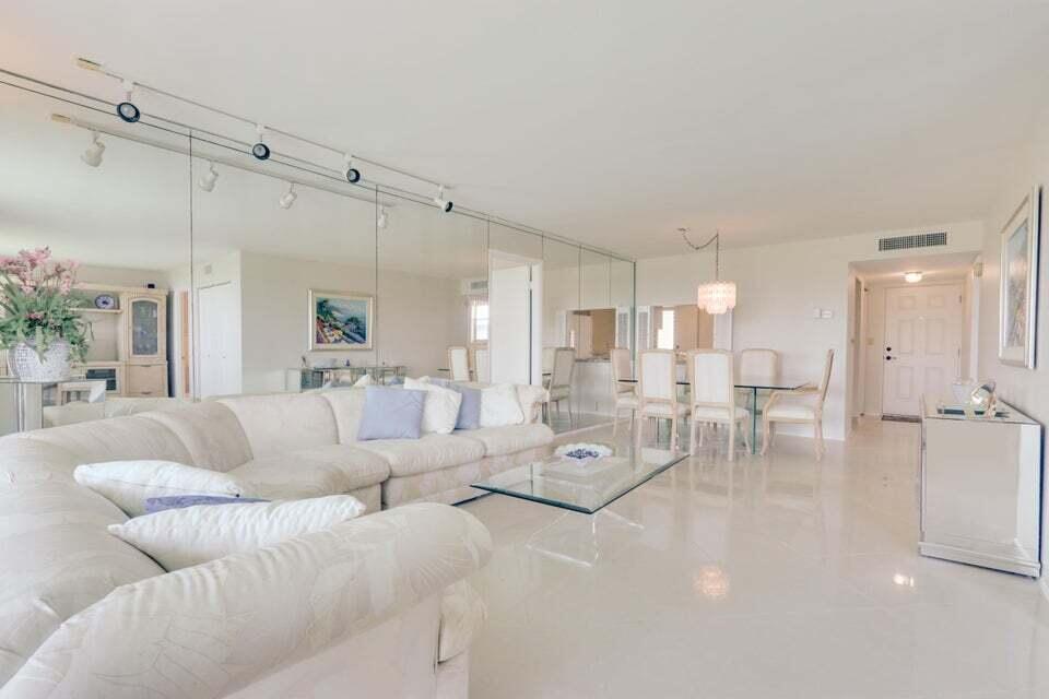 This is the one! Stunning unit that has been recently upgraded with a newly remodeled kitchen, fresh paint throughout, polished tile floors, and popcorn removal from the ceilings of every room really makes this property feel like it's brand new. This ideal location is near plenty of restaurants and shops and you can even get to the beach in just minutes. Sunset views from the massive screened in patio overlooks acres of wide open space! Both large bedrooms conveniently have full bathrooms attached, and the laundry room off of the kitchen features a nice size washer and dryer plus room for storage. Everything has been tastefully done in this unit ensuring it will not last long!