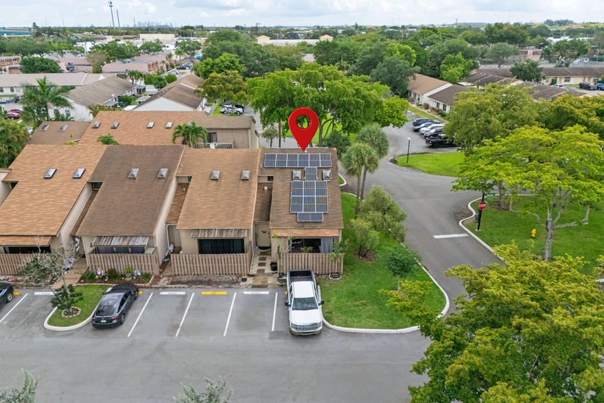 Move-in ready! Stylish end-unit with great natural light and a privacy-fenced patio for outdoor living. Solar PV system included with the sale means consistently low electric bills with no extra payments. Pre-wired for EV charging adds future-ready convenience. Fee simple ownership (not a condo) and FHA eligibility open the door for more buyers. Ideal for a first purchase or a smarter alternative to paying for student housing near NSU. Clean, updated, and ready now—opportunities like this in this condition don't come up often.  Stylishly updated and truly move-in ready—no projects, no surprises, just unpack and enjoy. Turnkey with modern finishes throughout. Skip the renovations and start living from day one.  Solar PV system is included with the house. This means that you can let the sun reduce your electric bill with no extra payments.