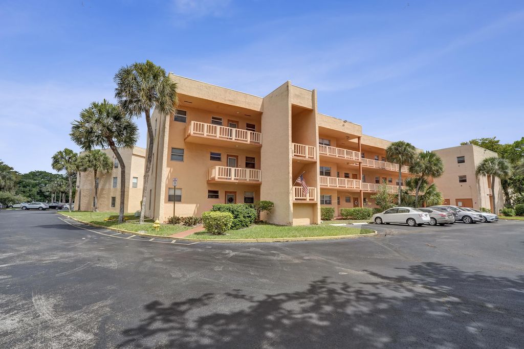 Photo of 8390 Lagos De Campo Boulevard #301, Tamarac, FL 33321 (MLS # B26019129)