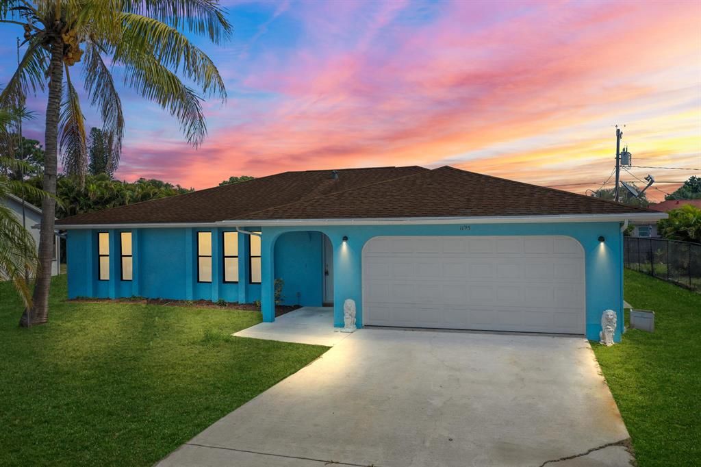 Photo of 1125 SE Sabina Lane, Port St Lucie, FL 34983 (MLS # R10878055)