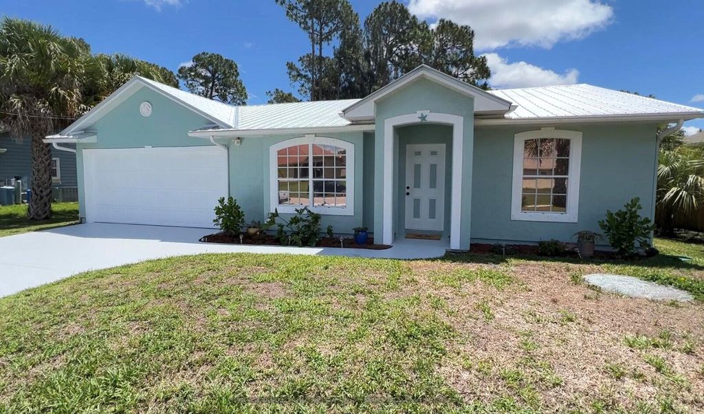 Photo of 3173 SW Mcmullen Street St, Port St Lucie, FL 34953 (MLS # R10805142)