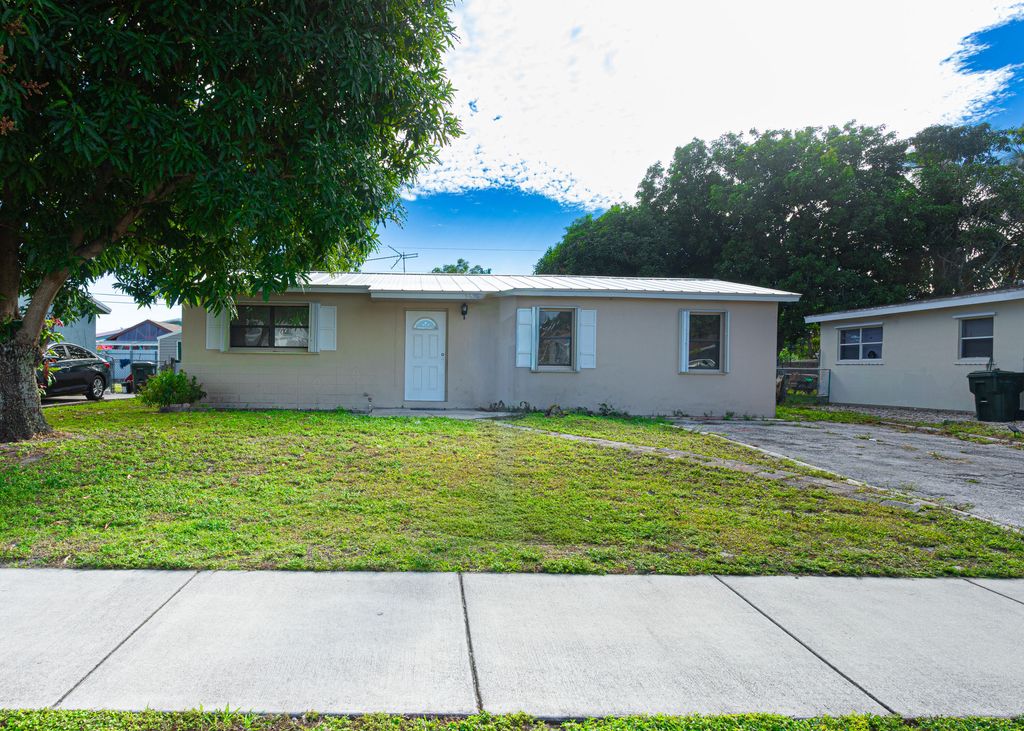 Photo of 5624 S 37th Court, Greenacres, FL 33463 (MLS # R11150693)