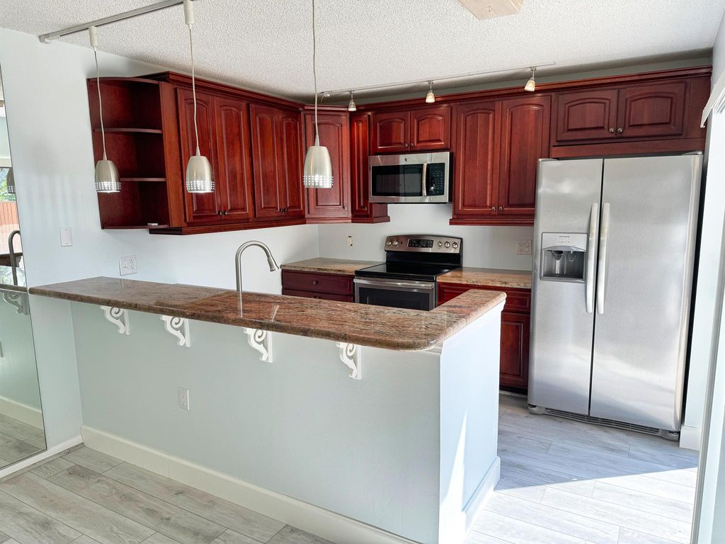 Photo of 1824 18th Court #D, Jupiter, FL 33477 (MLS # R10948130)