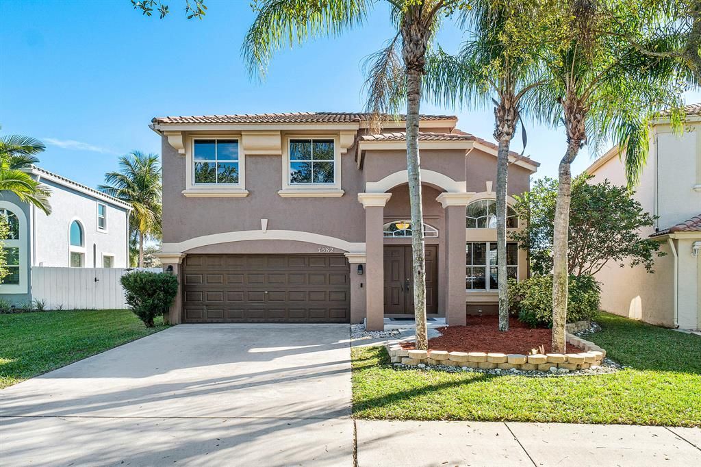 Photo of 7582 Oak Grove Circle, Lake Worth, FL 33467 (MLS # R10770618)