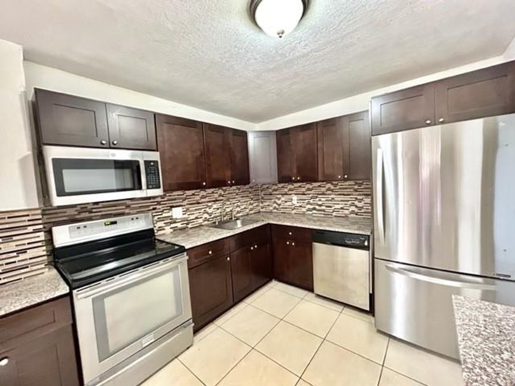 Photo of 6101 N Falls Circle Drive #402, Lauderhill, FL 33319 (MLS # F10548964)