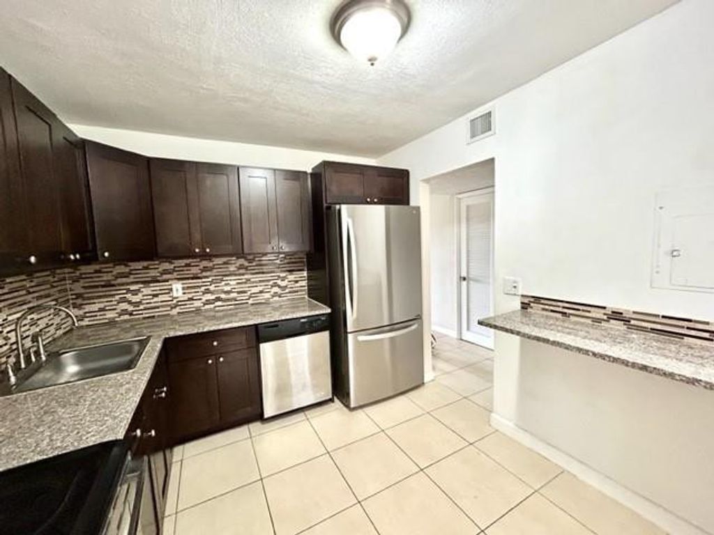 Photo of 6101 N Falls Circle Drive #402, Lauderhill, FL 33319 (MLS # F10548964)
