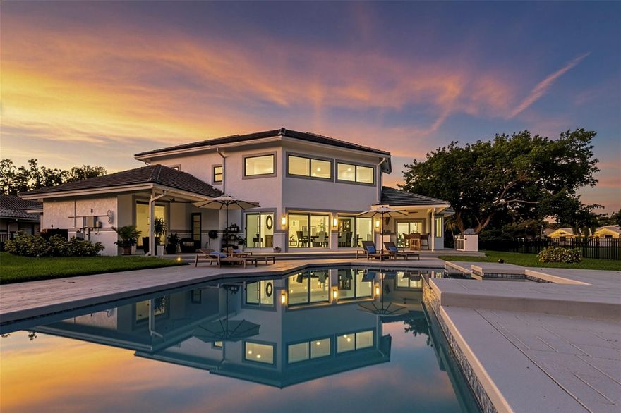 Welcome to this beautiful, completely remodeled home in the prestigious gated community of Maplewood Isles.  5 bedrooms, 4.5 Bathrooms plus an office. Endless amount of upgrades including a beautiful eat in kitchen with all new Wolf appliances and quartzite counter tops, porcelain floors throughout. Each bedroom has custom closets. Impact windows and doors, new roof, 3 car garage with epoxy floors, new water heater, new sprinkler system. Heated- salt water pool, newly resurfaced and all new pool equipment. 26K home generator. Full house security system. Full house water filtration system and reverse osmosis! New elevator. AC garage (single car). New fence. Outdoor kitchen. Conveniently located to so many restaurants, Costco and BJ’s wholesale, Trader Joes and the Coral Springs hospital.