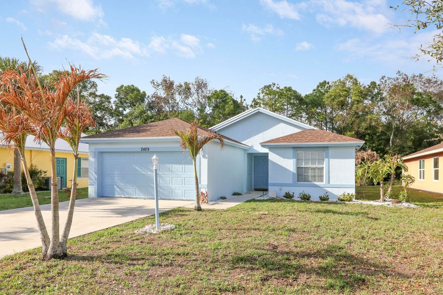 A rare opportunity to own this 4 bedroom, 2 bath, 2 car garage CBS home in the River Forest area of St. Lucie Falls in Stuart.  One of the only streets not HOA mandated and free of restrictions.  The home is light bright and airy with a split floor plan and vaulted ceilings. The kitchen has been updated to include new cabinetry and quartz like counters with stainless steel appliances. The kitchen overlooks a large great room that is ideal for entertaining with open views to the backyard and preserve.  The primary bedroom features 2 walk in closets and updated primary bath including walk in shower and seamless shower doors.  New roof installed in October of 2024. Completely painted top to bottom with new light fixtures and door hardware. A must see!  All sizes approximate.