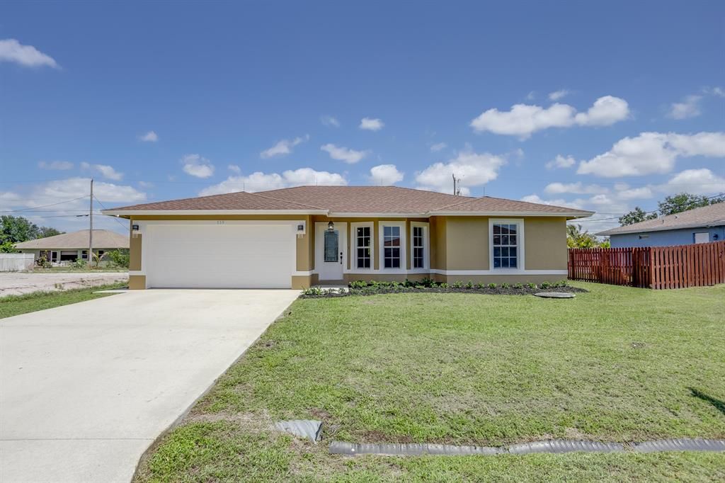 Photo of 559 SW Halifax Avenue, Port Saint Lucie, FL 34953 (MLS # R10675737)