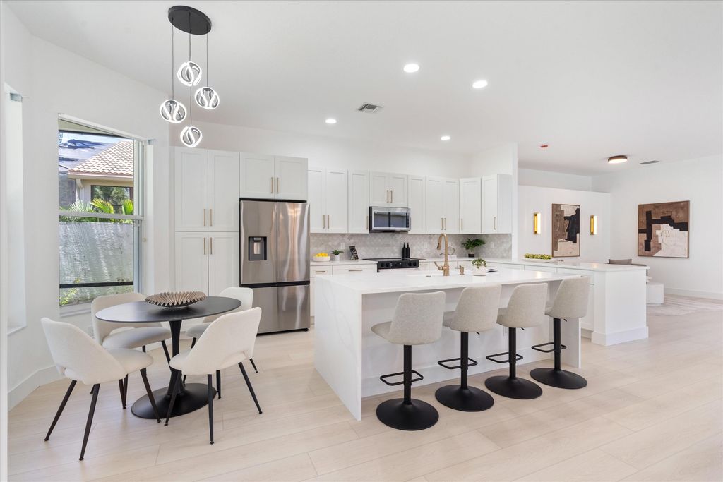 Photo of 7102 Prado Lake Drive, Delray Beach, FL 33446 (MLS # B26021970)