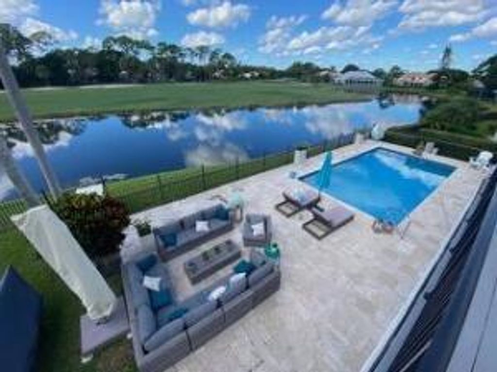 Photo of 21 Marlwood Lane, Palm Beach Gardens, FL 33418 (MLS # R10919413)